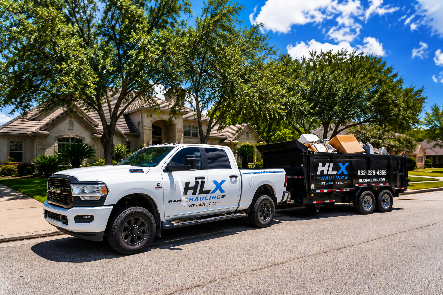 HLX Hauling white Ram 2500 pulling a black dump trailer loaded with junk, parked outside a suburban home on a sunny day